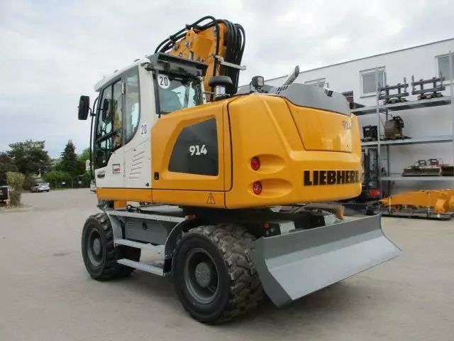 2023 Liebherr A914 Litronic wheel excavator, rear three-quarter view 2023 Liebherr A914 Litronic wheel excavator, rear three-quarter view