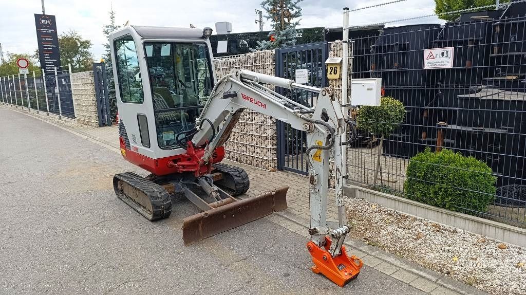 2012 Takeuchi TB219 mini excavator, front three-quarter view