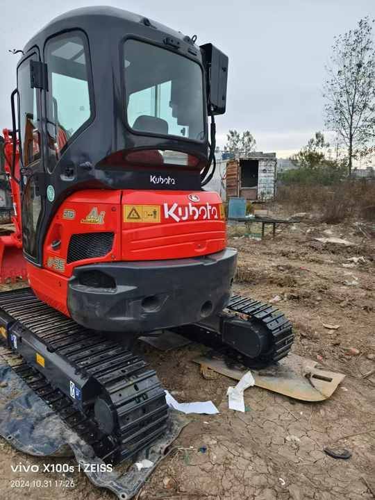 Kubota U35 mini excavator, rear three-quarter view Kubota U35 mini excavator, rear three-quarter view