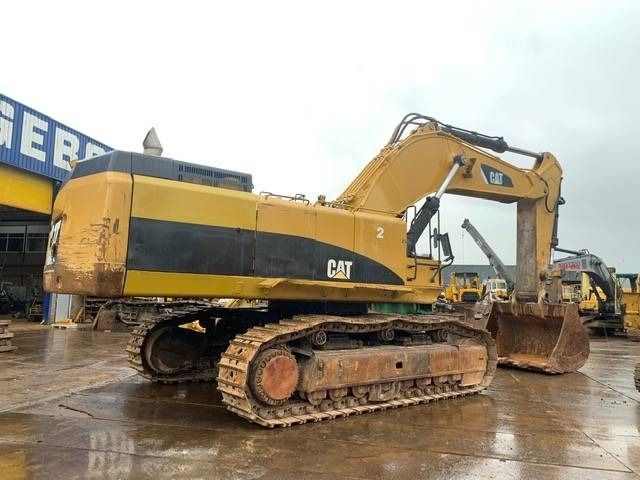 2010 Caterpillar 385CL crawler excavator, side profile view