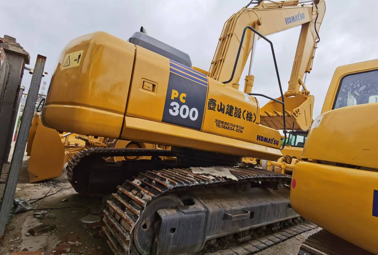 2019 Komatsu PC300-7 crawler excavator, rear three-quarter view 2019 Komatsu PC300-7 crawler excavator, rear three-quarter view