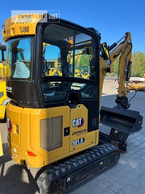 2022 Caterpillar 301.8-05A mini excavator, rear three-quarter view