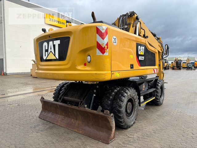 2018 Caterpillar M322F wheel excavator, rear three-quarter view 2018 Caterpillar M322F wheel excavator, rear three-quarter view