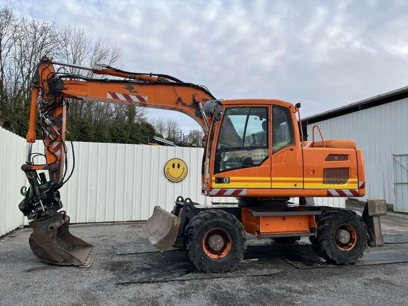 2012 Volvo EW140D wheel excavator, side profile view