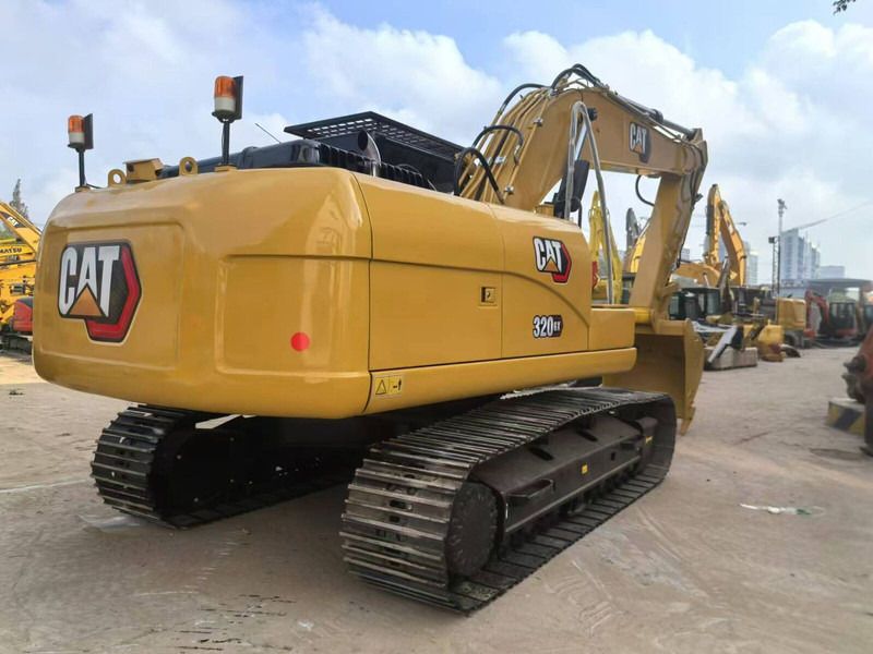 2024 Caterpillar 320GX crawler excavator rear three-quarter view