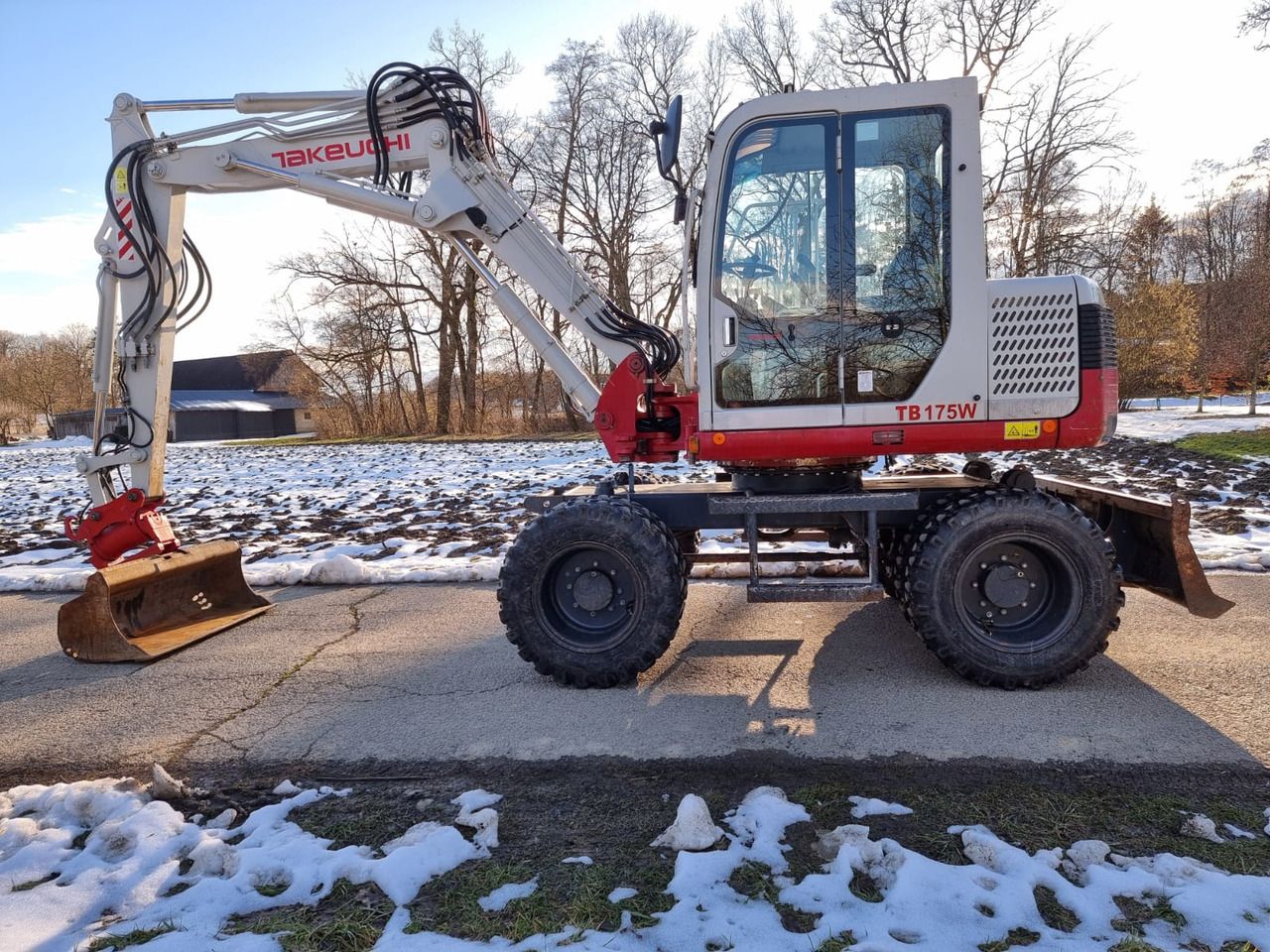 2013 Takeuchi TB175 W wheel excavator, side profile view