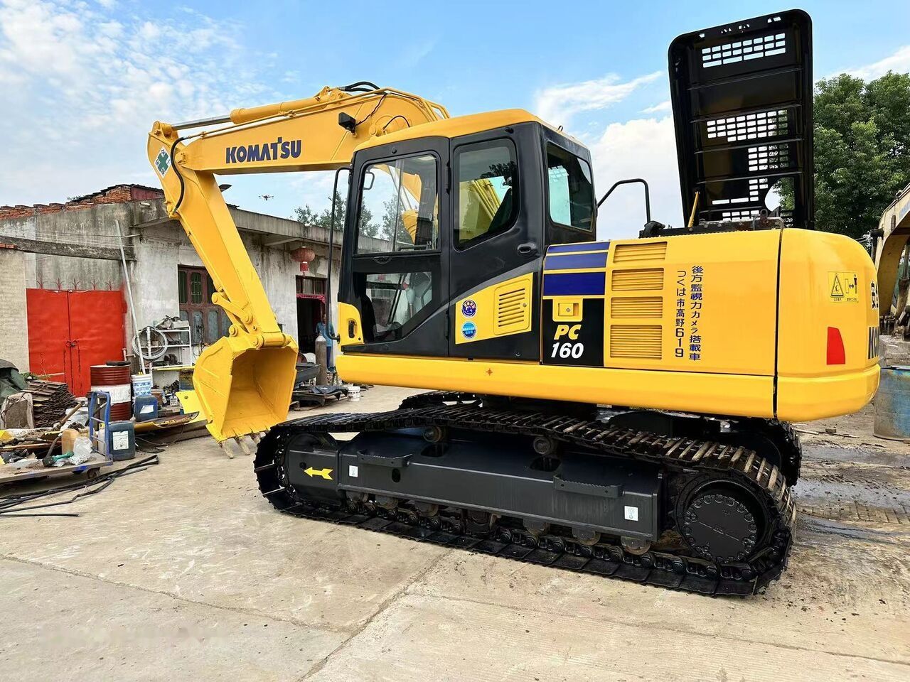 Komatsu PC160 crawler excavator, side view Komatsu PC160 crawler excavator, side view