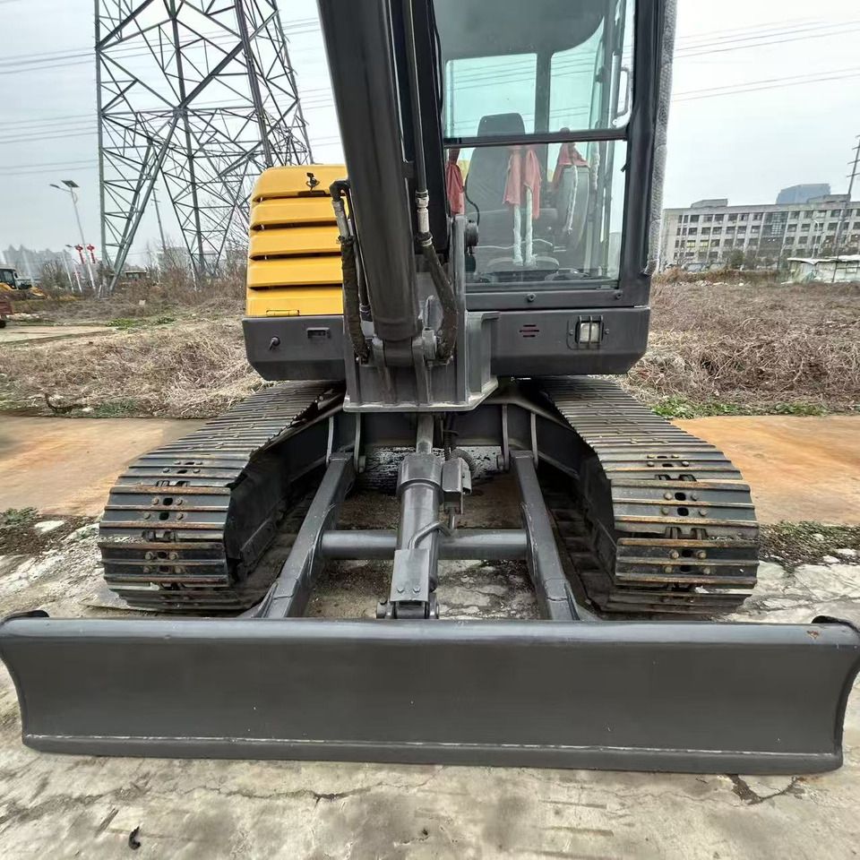 2023 Volvo EC60C mini excavator front view with blade