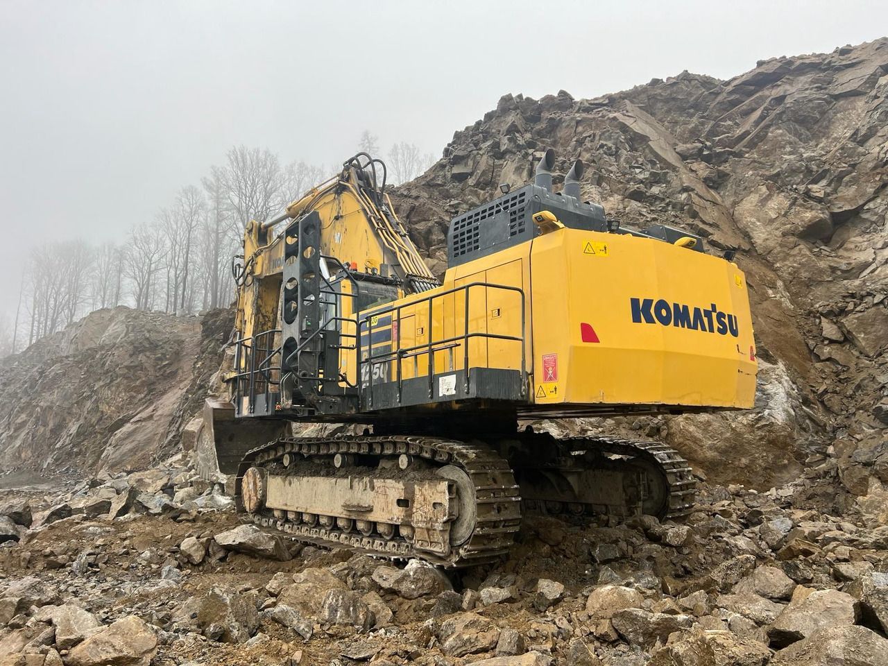 2020 Komatsu PC1250-11E0 crawler excavator rear three-quarter view 2020 Komatsu PC1250-11E0 crawler excavator rear three-quarter view