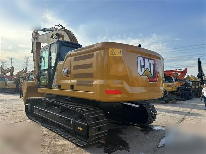 2023 Caterpillar 330 crawler excavator, rear three-quarter view 2023 Caterpillar 330 crawler excavator, rear three-quarter view