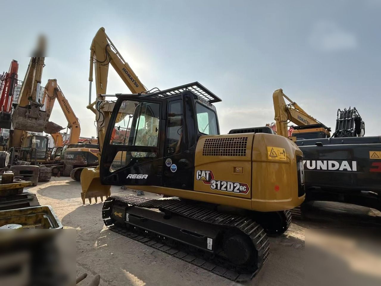 2022 Caterpillar 312D2 GC crawler excavator, side view