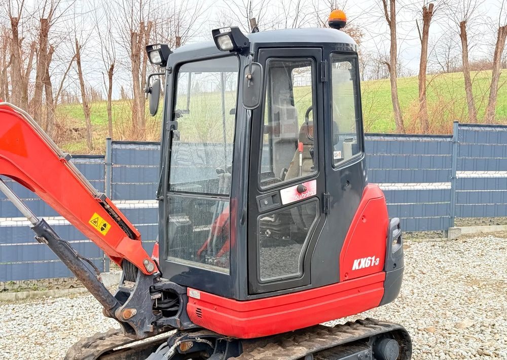 2015 Kubota KX61-3 mini excavator cab side view 2015 Kubota KX61-3 mini excavator cab side view