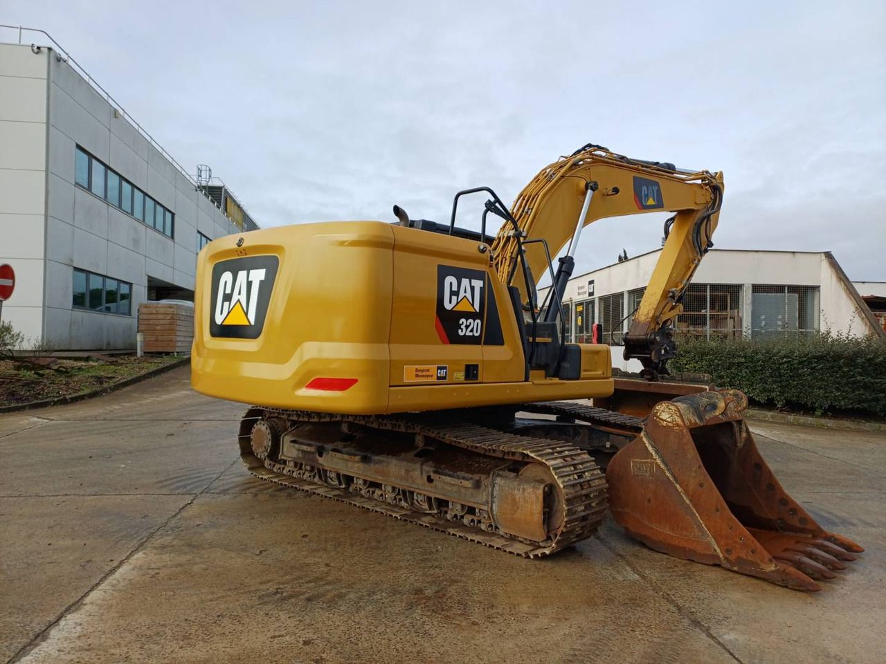 2019 Caterpillar 320 crawler excavator, rear three-quarter view