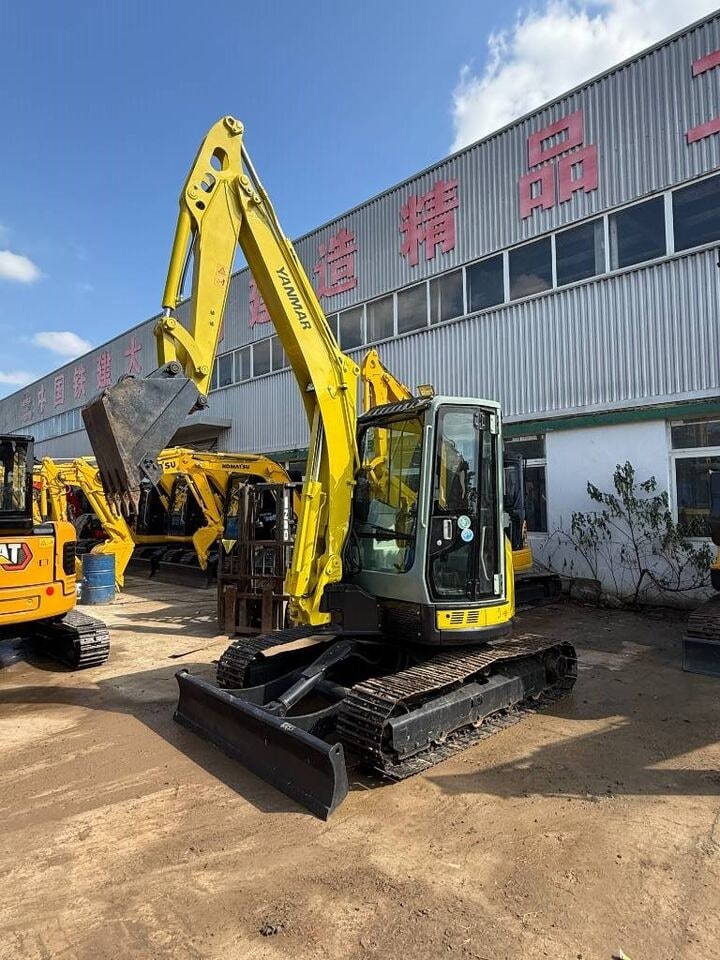 2025 Yanmar VIO55 Mini Excavator, front three-quarter view 2025 Yanmar VIO55 Mini Excavator, front three-quarter view