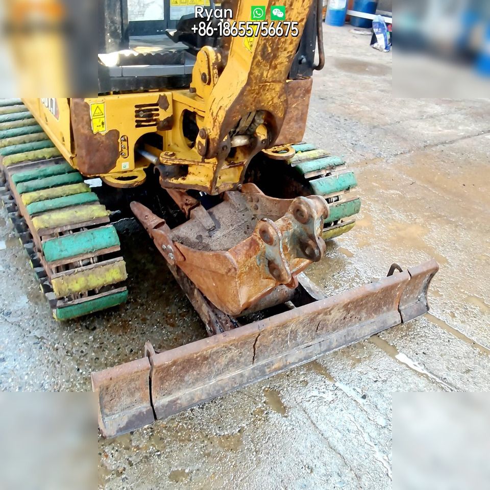 2020 Caterpillar 301.7CR mini excavator front view with blade 2020 Caterpillar 301.7CR mini excavator front view with blade