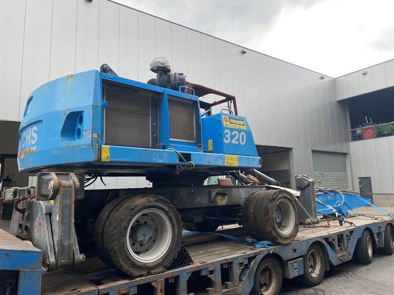 2013 Fuchs MHL320 material handler, side view