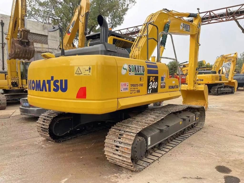 2023 Komatsu PC240LC-8 crawler excavator, rear three-quarter view 2023 Komatsu PC240LC-8 crawler excavator, rear three-quarter view