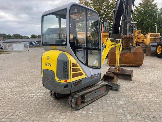 2014 Wacker Neuson 1404 mini excavator, rear three-quarter view 2014 Wacker Neuson 1404 mini excavator, rear three-quarter view