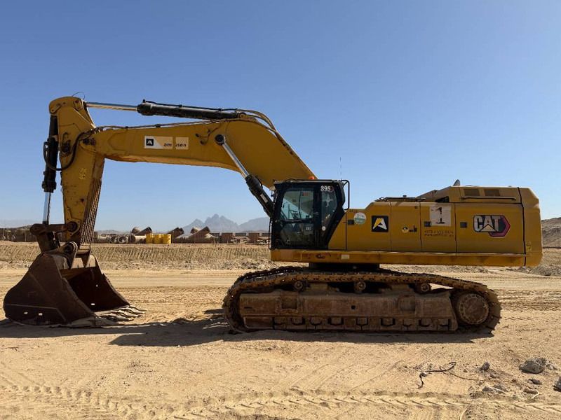 2022 Caterpillar 395 crawler excavator side view 2022 Caterpillar 395 crawler excavator side view