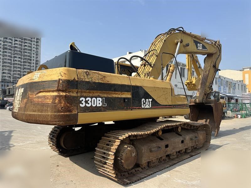 2012 Caterpillar 330BL crawler excavator, rear three-quarter view 2012 Caterpillar 330BL crawler excavator, rear three-quarter view