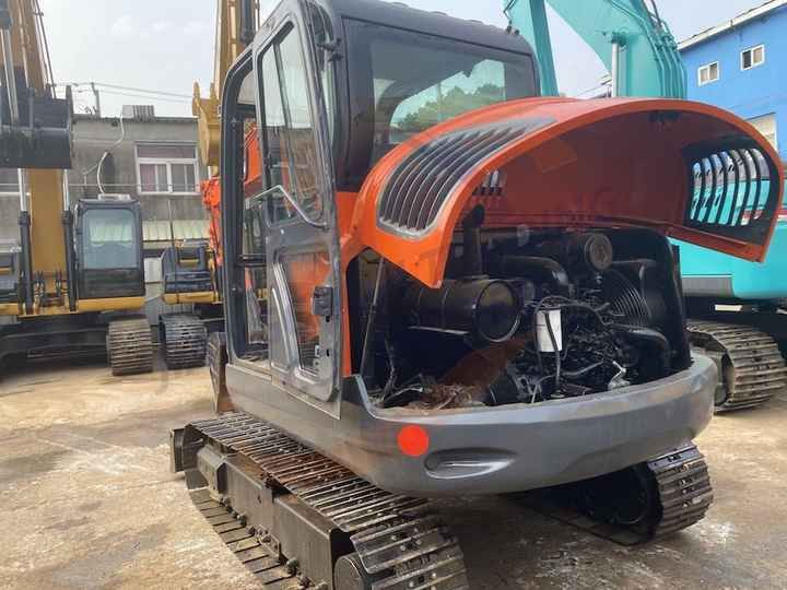 2018 Doosan DX60 crawler excavator with engine compartment open 2018 Doosan DX60 crawler excavator with engine compartment open