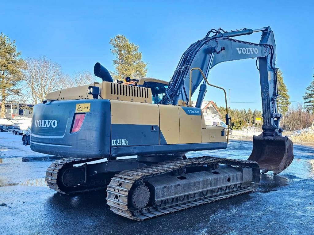 2013 Volvo EC250DL crawler excavator, rear three-quarter view