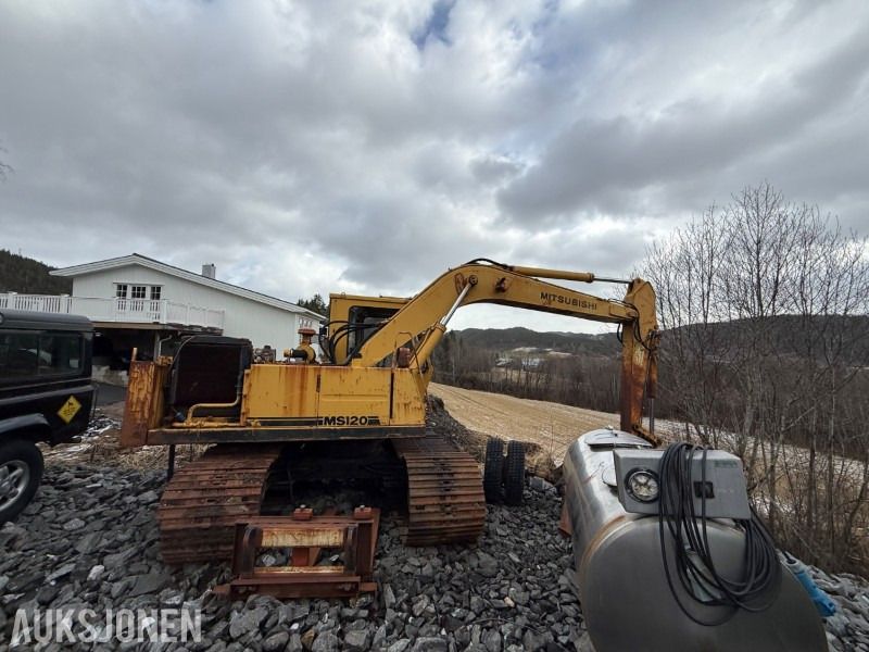 1985 Mitsubishi MS120-2 excavator, rear three-quarter view