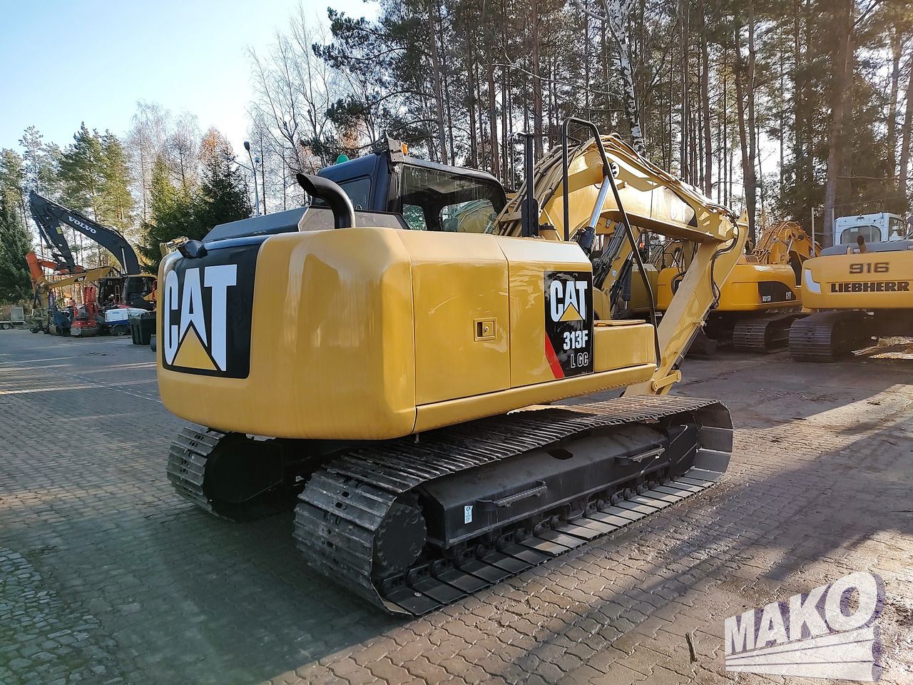 2015 Caterpillar 313FLGC crawler excavator, rear three-quarter view 2015 Caterpillar 313FLGC crawler excavator, rear three-quarter view