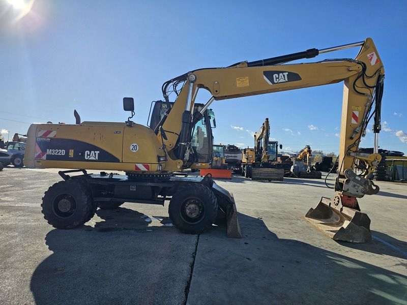 2011 Caterpillar M322D wheel excavator side view 2011 Caterpillar M322D wheel excavator side view