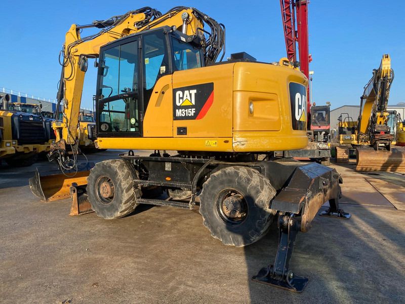 2018 Caterpillar M315F wheel excavator side view 2018 Caterpillar M315F wheel excavator side view
