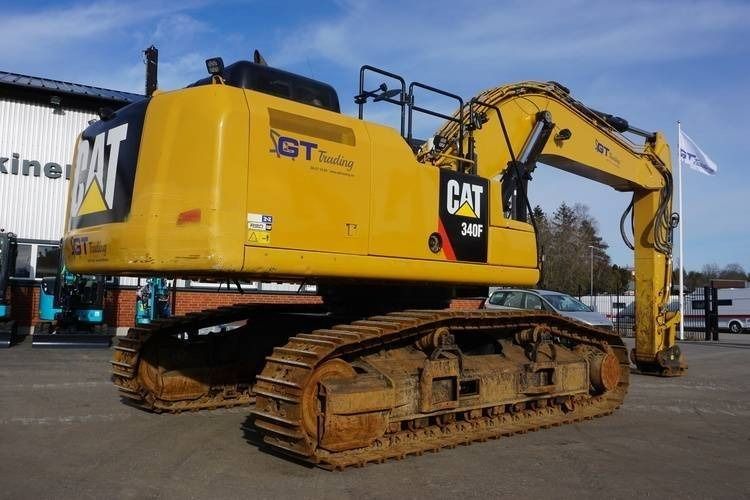 2016 Caterpillar 340F crawler excavator, rear three-quarter view
