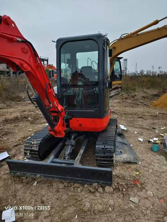 Kubota U25 Mini Excavator, front three-quarter view