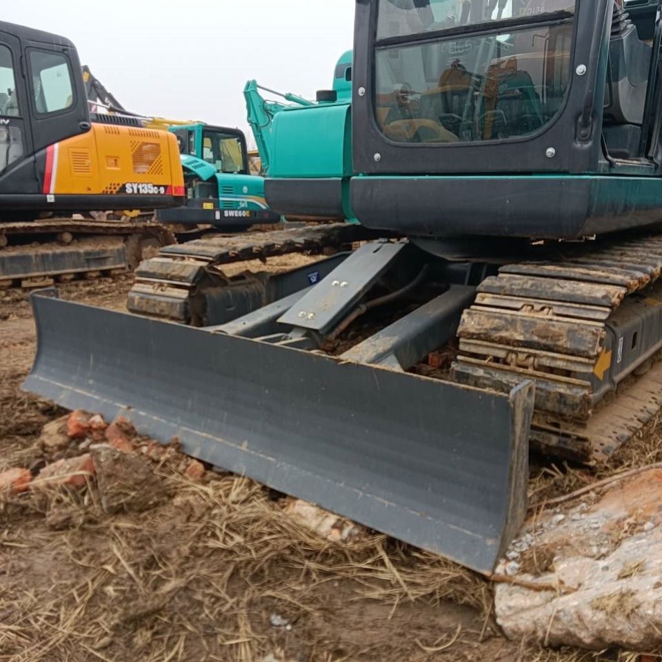 2023 Kobelco SK75-8 mini excavator front view with blade 2023 Kobelco SK75-8 mini excavator front view with blade