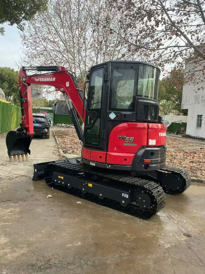 2024 Yanmar VIO55-6B mini excavator, rear three-quarter view
