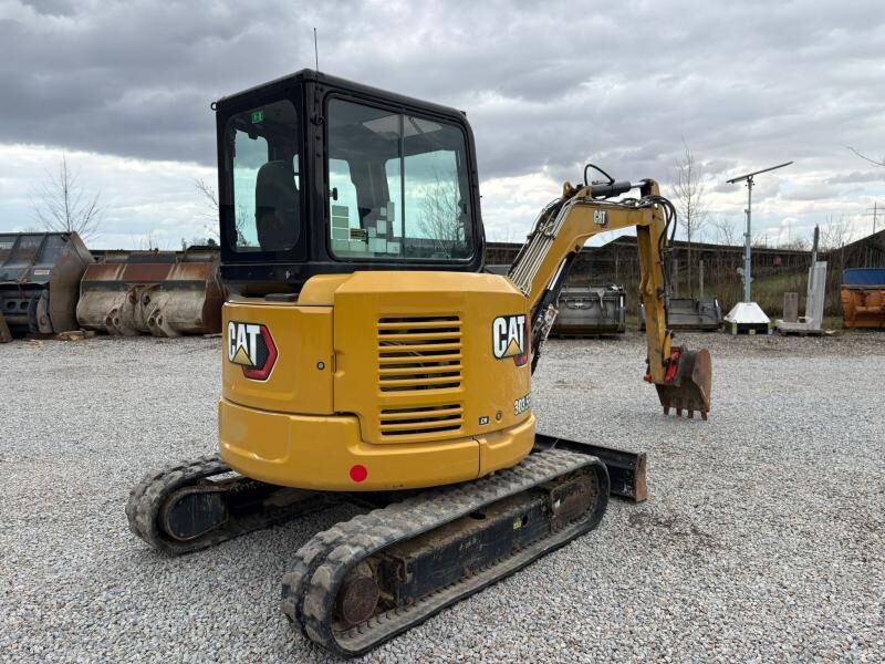 2021 Caterpillar 303.5E mini excavator, rear three-quarter view 2021 Caterpillar 303.5E mini excavator, rear three-quarter view