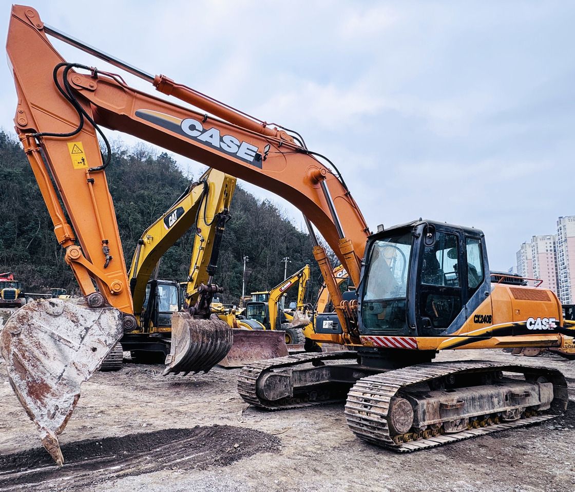Case CX240B crawler excavator, side view Case CX240B crawler excavator, side view