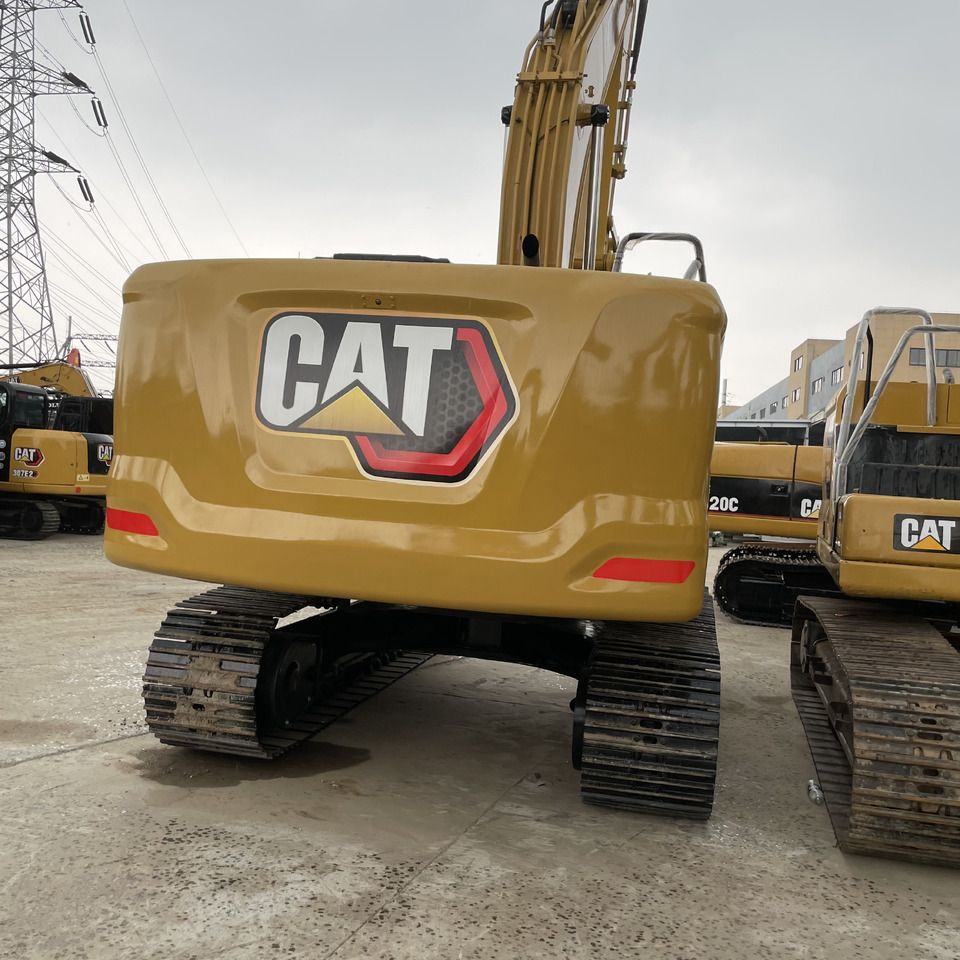 2024 Caterpillar 320GC crawler excavator, rear view