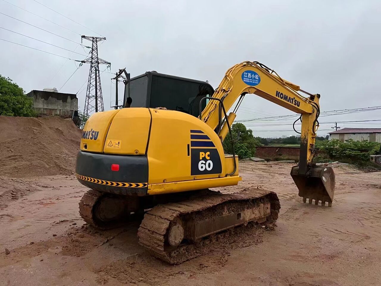 2023 Komatsu PC60-8 mini excavator, rear three-quarter view 2023 Komatsu PC60-8 mini excavator, rear three-quarter view