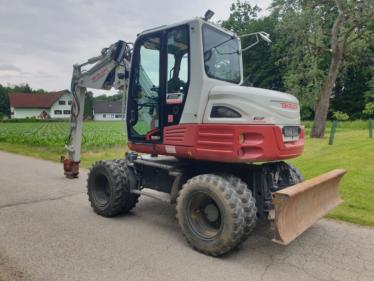2013 Takeuchi TB295W wheel excavator, rear three-quarter view 2013 Takeuchi TB295W wheel excavator, rear three-quarter view