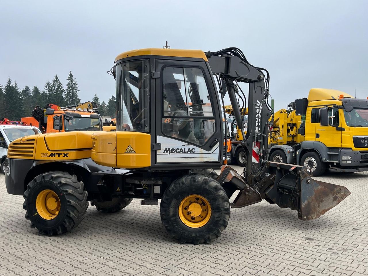 2010 Mecalac 12MTX wheel excavator, side view