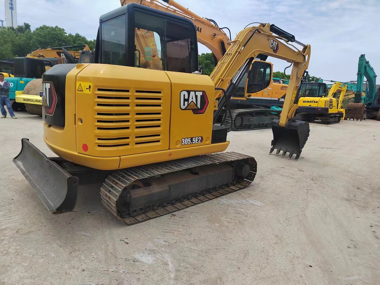 2021 Caterpillar 305.5E2 mini excavator, rear three-quarter view 2021 Caterpillar 305.5E2 mini excavator, rear three-quarter view