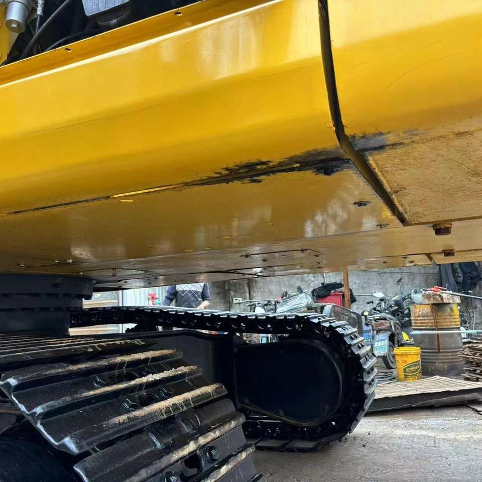 Komatsu PC300 crawler excavator undercarriage view Komatsu PC300 crawler excavator undercarriage view
