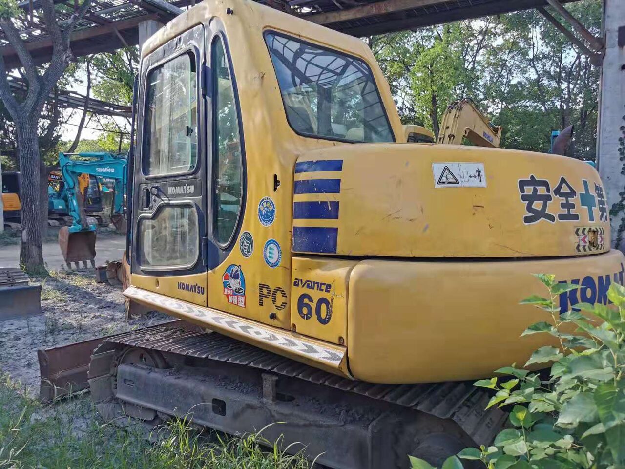 2023 Komatsu PC60-7 excavator, rear three-quarter view 2023 Komatsu PC60-7 excavator, rear three-quarter view