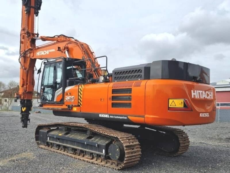 2023 Hitachi ZX350LC-7 crawler excavator, rear three-quarter view 2023 Hitachi ZX350LC-7 crawler excavator, rear three-quarter view