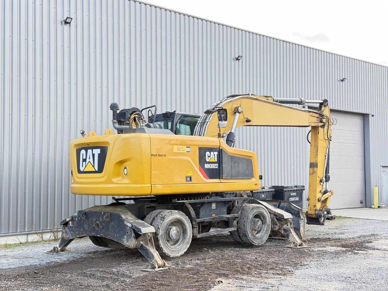 2018 Caterpillar MH3022 wheel excavator, rear three-quarter view 2018 Caterpillar MH3022 wheel excavator, rear three-quarter view