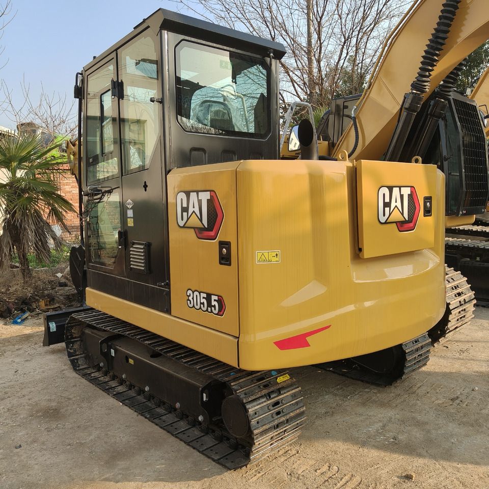 2026 Caterpillar 305.5E2 mini excavator rear three-quarter view 2026 Caterpillar 305.5E2 mini excavator rear three-quarter view
