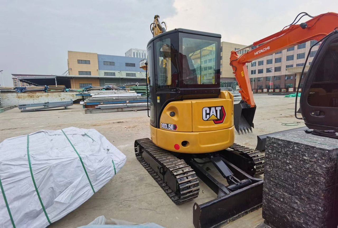 2023 Caterpillar 303.5E mini excavator, rear three-quarter view 2023 Caterpillar 303.5E mini excavator, rear three-quarter view