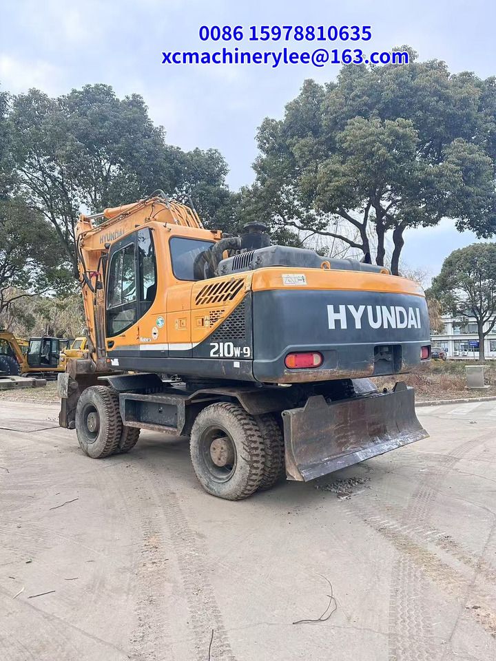 2023 Hyundai R210W-9 wheel excavator rear three-quarter view 2023 Hyundai R210W-9 wheel excavator rear three-quarter view