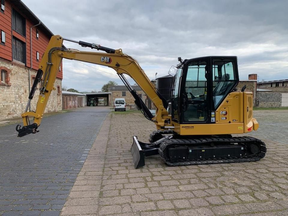 Caterpillar 306CR-07A mini excavator side view Caterpillar 306CR-07A mini excavator side view