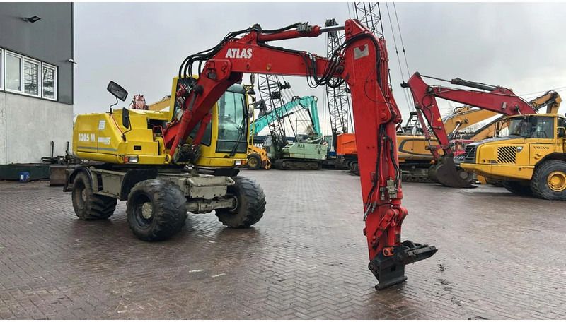2004 Atlas 1305 M wheel excavator, side profile view 2004 Atlas 1305 M wheel excavator, side profile view